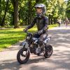 36V Electric Dirt Bike for Kids with Brushless Motor, Up to 9.9 MPH, Inflatable Tires and Rear Suspension, Black